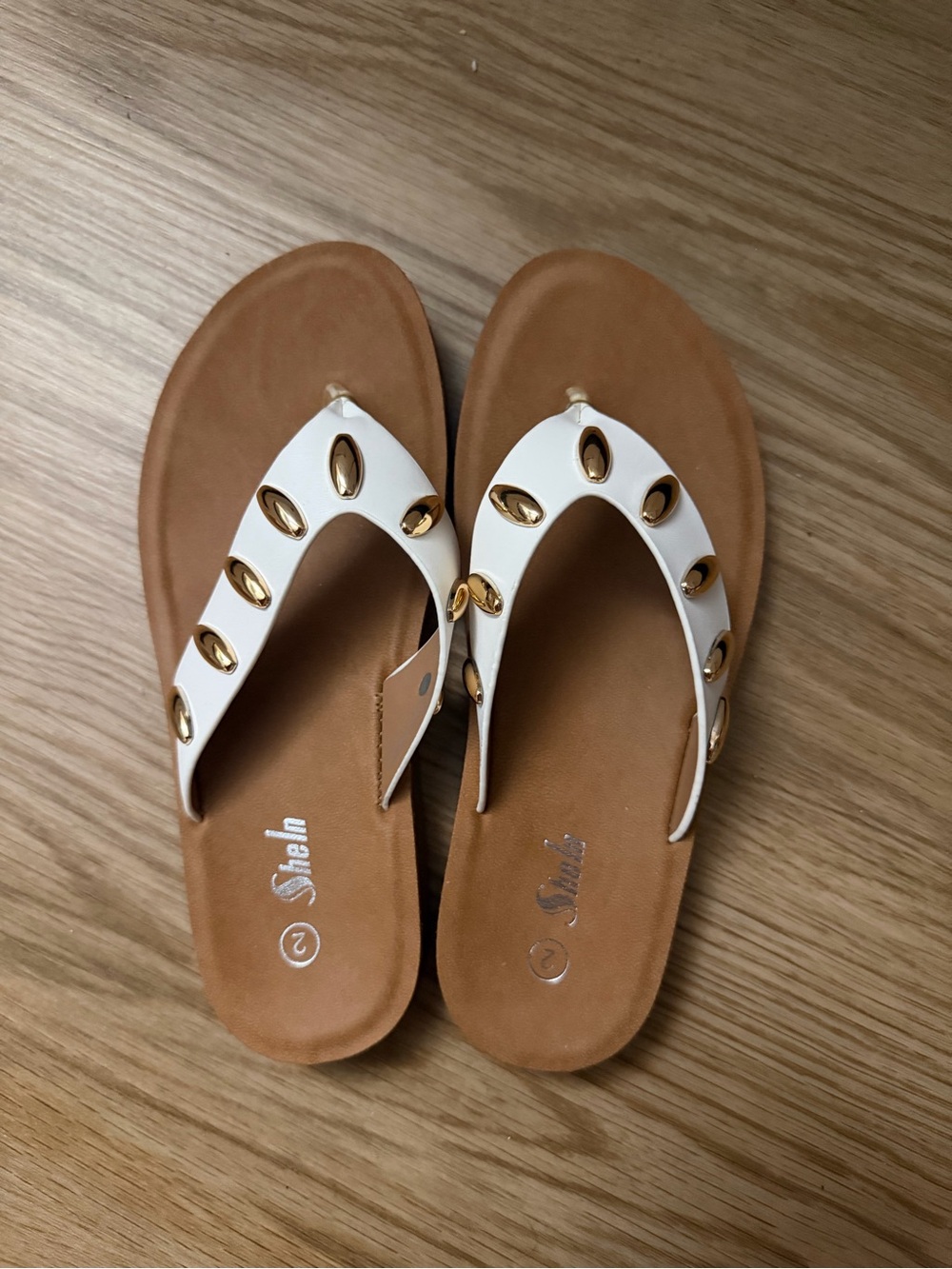 Stellah White Thong Sandals with Gold Teardrop Accents